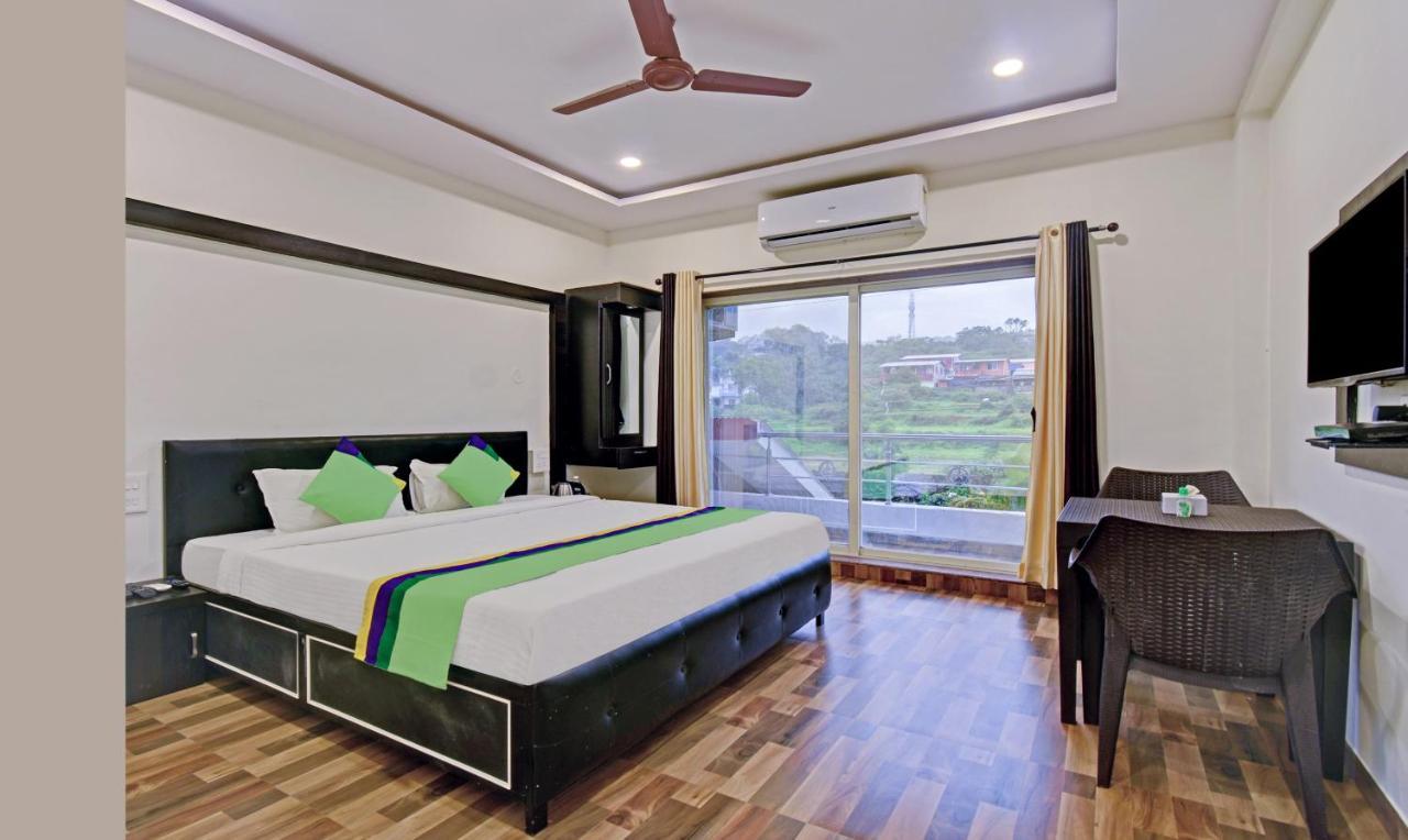 Treebo Paradise Inn With Mountain View มหาบาเลชวาร์ ภายนอก รูปภาพ