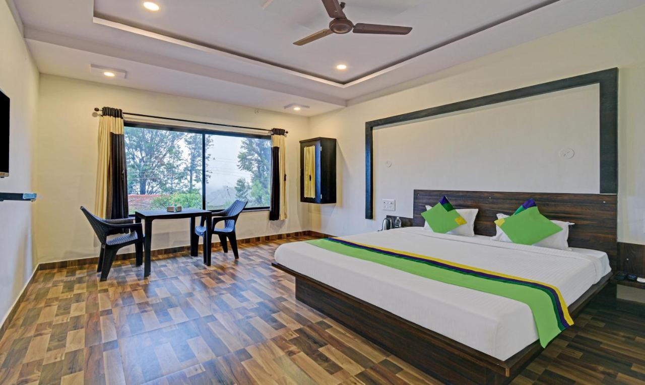 Treebo Paradise Inn With Mountain View มหาบาเลชวาร์ ภายนอก รูปภาพ